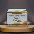 Solya Vitamin D3 Oral Solution packaging on a reflective surface with a gradient background